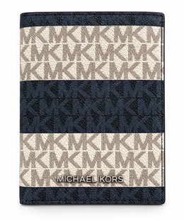 Michael Kors Jet Set Travel passport wallet in navy and vanilla monogram stripe front