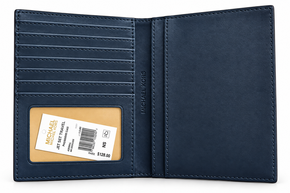 Michael Kors Jet Set Travel passport wallet in navy open interior with card slots and original tag